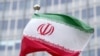The flag of Iran flutters in the wind outside of the IAEA headquarters during the International Atomic Energy Agency IAEA's Board of Governors meeting at the agency's headquarters in Vienna, Austria, on November 20, 2024.