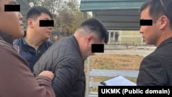 Шектүү адвокатты кармоо учуру. УКМК тараткан сүрөт.