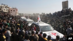 Автомобили Красного Креста, прибывшие за заложниками в сектор Газа.