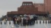 Tourists wait in line in front of Soviet state founder Vladimir Lenin's mausoleum on Red Square in Moscow. (file photo)