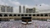 SAUDI ARABIA -- Muslim pilgrims circumambulate around the Kaaba, the cubic building at the Grand Mosque, ahead of the Hajj pilgrimage in the Muslim holy city of Mecca, August 8, 2019