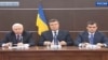 Віктор Янукович, Віктор Пшонка і Олександр Захарченко після втечі з України, квітень 2014 року 
