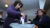 Armenia - A voter casts a ballot at a polling station in Gyumri, 2Oct2016.