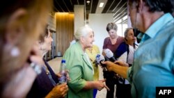 Bosnian women from the Mothers Of Srebrenica group talk to the press in The Hague after the verdict on June 27.
