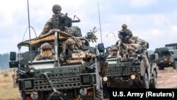 НАТО күчтөрүнүн Польшадагы машыгуусу. 14-июнь, 2018-жыл.