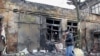 Магазин в Донецке, разрушенный обстрелом