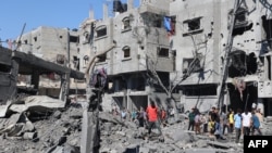 2025-жылдын 4-июлу. Газа тилкесинин борборундагы Аль-Бурейж лагери Израилдин соккусунан кийин.