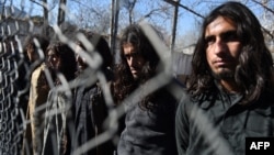 "Talyban" hereketiniň söweşijileri.