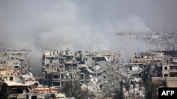 Последствия бомбардировок в Восточной Гуте