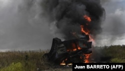 Знищений російський бронетранспортер МТ-ЛБ на околиці Ізюма Харківської області під час наступу ЗСУ, 14 вересня 2022 року