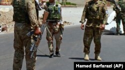 آرشیف- شماری از نیروهای سابق امنیتی افغانستان