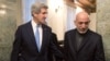 Afghan President Hamid Karzai (right) with U.S. Secretary of State John Kerry at the Presidential Palace in Kabul on March 25