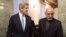 Afghan President Hamid Karzai (right) with U.S. Secretary of State John Kerry at the Presidential Palace in Kabul on March 25