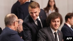 Ираклий Кобахидзе рядом с канцлером ФРГ и президентом Франции