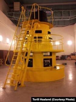 Одна из турбин в машинном зале электростанции. Фотография Торилл Хааланд