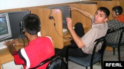 Youths at an Internet cafe in the Tajik capital, Dushanbe