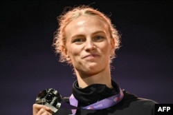 Марыя Жодзік з срэбраным мэдалём, 21 верасьня 2025 году, Токіё, Японія