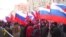 WATCH: Tens of thousands of people attended a pro-Kremlin march in central Moscow to mark National Unity Day on November 4. The holiday was created by President Vladimir Putin to celebrate a Russian victory over Polish forces in 1612. A few thousand people also took part in nationalist marches not affiliated with the Kremlin on the outskirts of the city. (RFE/RL's Russian Service)