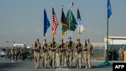NATO troops take part in ceremonies to mark the closure of the alliance's combat command center in Afghanistan earlier this week. 