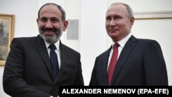 Россия -- и. о. премьер-министра Армении Никол Пашинян (слева) и президент России Владимир Путин, Москва, 27 декабря 2018 г.