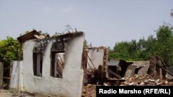 A burned-out house in the town of Borozdinovskaya where the incident happened in 2005. 
