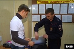 Олексій Гончаренко в райвідділку «Китай-город» у Москві, 1 березня 2015 року