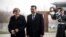 Macedonian Prime Minister Zoran Zaev (right) is welcomed to Berlin by German Chancellor Angela Merkel on February 21. 