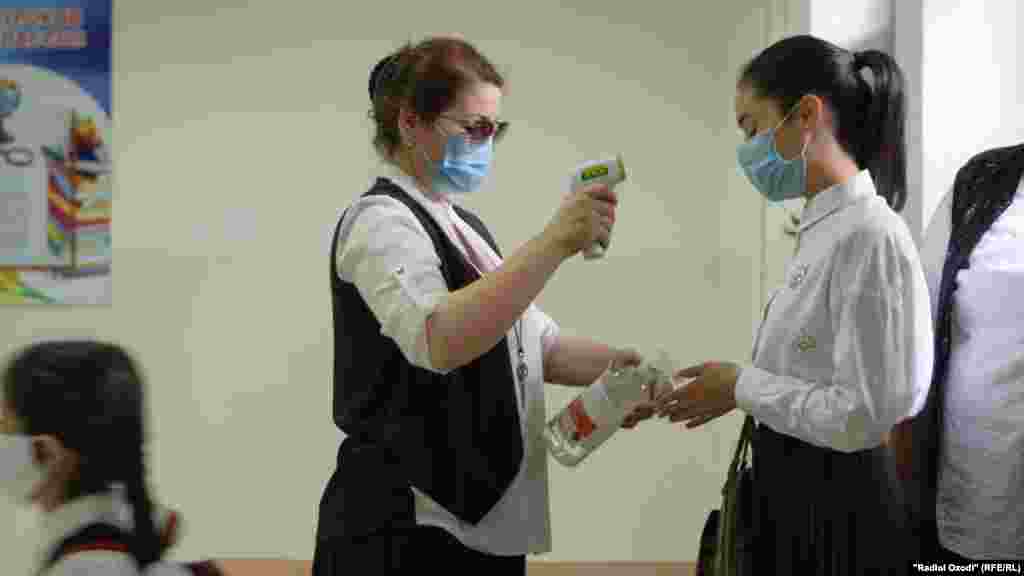 Students in Dushanbe had their temperatures taken on the first day of school on August 17.