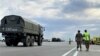Kazakhstan – Kazakhstan – military police and a military truck at highway from Taraz to Almaty. Baizak district, Zhambul region. 27 August 2021