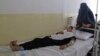 A schoolgirl receives treatment at a hospital after being poisoned in Takhar Province on May 23.