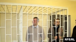 Bloggers Adnan Hajizada (left) and Emin Milli in court on December 22