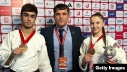 Паҳлавонони тоҷик, Икром Шамсов ва Мадина Қурбозода 