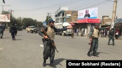 Маҳаллий полиция ҳужум амалга оширилган жойни қуршаб олди. 2019, 7 август.