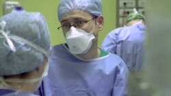 Battle Gear: Shortage Of Masks, Gowns Puts Medics In Danger