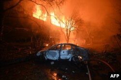 Харків під час удару російськими дронами 11 червня 2025 року. Москва засуджує удари по «сплячих мирних містах Ірану», але вже понад три роки робить те саме щодо українського цивільного населення