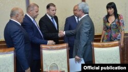 Armenia - President Serzh Sarkisian (R) meets with leaders of the Prosperous Armenia Party to discuss constitutional reform, 26August, 2015