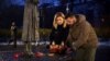 Ukrainian President Volodymyr Zelenskiy and his wife, Olena Zelenska, attend a memorial to the victims of the Holodomor famine of 1932-1933, in Kyiv on November 26.