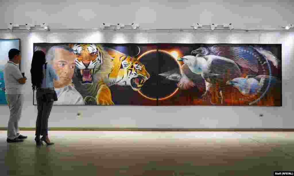 Бул сүрөттө Каримов жолборстор - анын &quot;колдоочулары&quot; менен кузгундарга каршы турганы көрсөтүлгөн. Жергиликтүү гиддин айтымында, кузгундар &quot;ислам терроризмин&quot; символдоштурат.