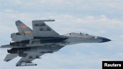 Չինական օդուժին պատկանող Սու-27 կործանիչը ռազմական առաջադրանքը կատարելիս, արխիվ