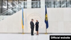 Президент України Петро Порошенко і директор-розпорядник МВФ Крістін Лаґард. Вашингтон, 20 червня 2017 року
