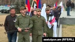 A group calling themselves “Revolutionary Guards”