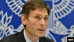 Том Малиновський