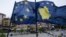 The EU and Kosovar flags in the main square of Pristina