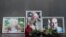 Flowers outside Moscow's Central House of Journalists in memory of three Russian journalists killed in the Central African Republic (Left to right: Aleksandr Rastorguyev, Kirill Radchenko, and Orkhan Dzhemal)
