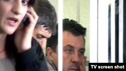 Российские офицеры не признали себя виновными в тбилисском суде.
Кадр Первого канала www.1tv.ru