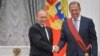 Владимир Путин и Сергей Лавров во время вручения Государственных премий. Москва, Кремлевский дворец, 21.05.2015
