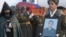 Armenia - The funeral of Lieutenant Gurgen Markarian, an Armenian army officer who was axe-murdered by an Azerbaijani colleague during a NATO training course in Budapest, 25Feb2004.