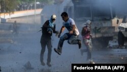 Վենեսուելա - Ցուցարարների և անվտանգության ուժերի բախումները Կարակասում, 1-ը մայիսի, 2019թ․