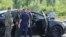 A car and employees of security services are seen at the scene where the body of former Russian Transport Minister Roman Starovoit was found. According to the Russian Investigative Committee, the body of Roman Starovoit with a gunshot wound was found in his car, the main version is suicide.