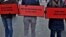 Москва, 25 февраля, активисты с плакатами в стиле "трех билбордов" на марше памяти Бориса Немцова